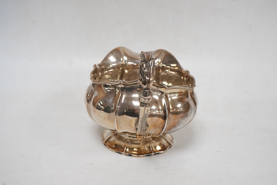 A George IV silver cream jug, with engraved monogram, by William, Charles and Henry Eley, London, 1824, height 10.5cm, 7.7oz.